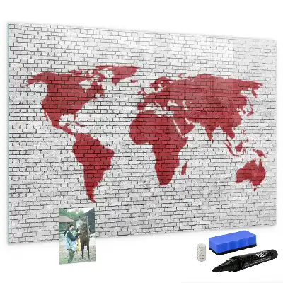 Pizarra de cristal magnética borrable con diseño de mapamundi sobre pared de ladrillo