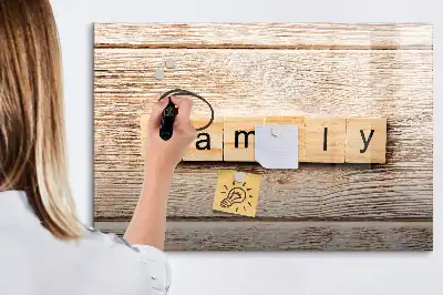 Pizarra magnética de pared con diseño de texto familia y rotulador
