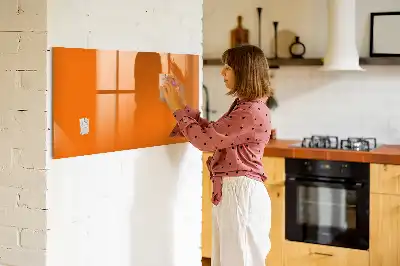 Pizarra borrable de cristal con imanes de color naranja