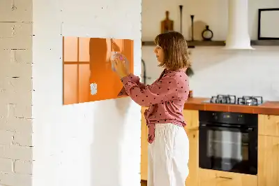 Pizarra borrable de cristal con imanes de color naranja