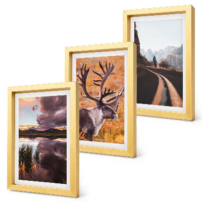 Juego de 3 cuadros decorativos Paisajes de montaña con renos y un camino en plena naturaleza.