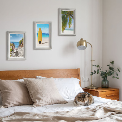 Juego de 3 cuadros decorativos Vistas vacacionales de la playa, las olas y las palmeras en el trópico.
