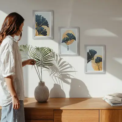 Juego de 3 cuadros decorativos con diseño de hojas de ginkgo sobre fondo claro