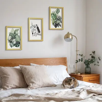 Juego de 3 cuadros decorativos con diseño de hojas de plantas en tonos verdes y frase sobre el vino