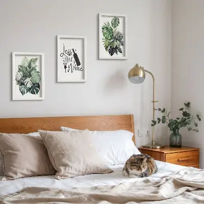 Juego de 3 cuadros decorativos con diseño de hojas de plantas en tonos verdes y frase sobre el vino