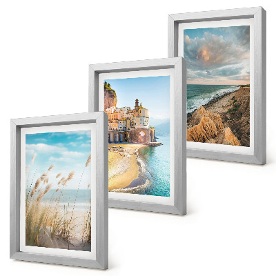 Juego de 3 cuadros decorativos Paisajes costeros con playa, ciudad y acantilados.