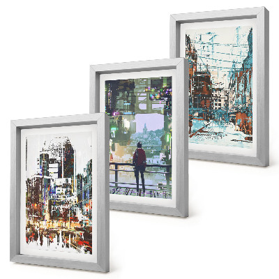 Tríptico enmarcado Ciudades modernas a color con una figura al fondo.