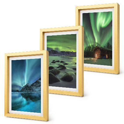Tríptico enmarcado Paisajes invernales con la aurora boreal sobre las montañas.