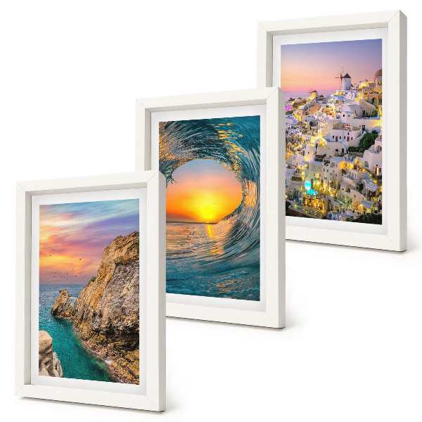 Juego de 3 cuadros decorativos Vistas del mar, las olas y las casas blancas en Santorini, Grecia.