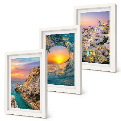 Juego de 3 cuadros decorativos Vistas del mar, las olas y las casas blancas en Santorini, Grecia.
