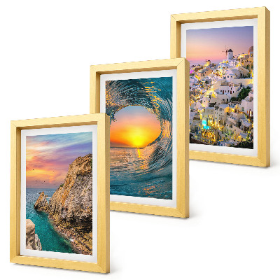 Juego de 3 cuadros decorativos Vistas del mar, las olas y las casas blancas en Santorini, Grecia.
