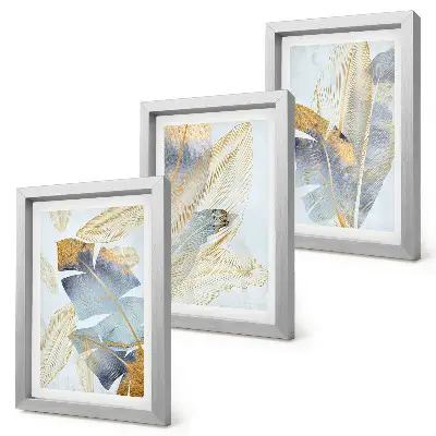 Juego de 3 cuadros decorativos con diseño de hojas en tonos azules y beige sobre fondo claro