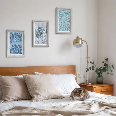 Juego de 3 cuadros decorativos con diseño de bosque invernal, flor azul y superficie de agua