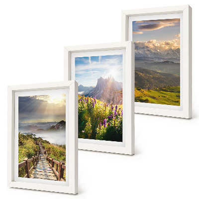 Juego de 3 cuadros decorativos Paisajes de montaña con flores, cielo y sendero.