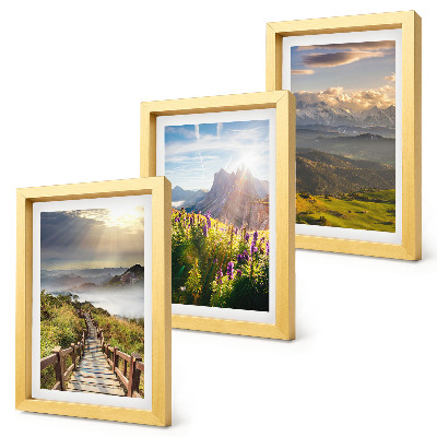 Juego de 3 cuadros decorativos Paisajes de montaña con flores, cielo y sendero.
