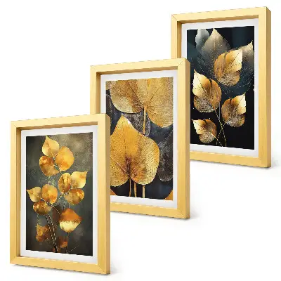 Juego de 3 cuadros decorativos con diseño de hojas en tonos amarillos sobre fondo oscuro