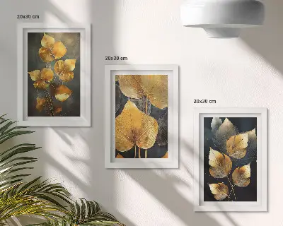 Juego de 3 cuadros decorativos con diseño de hojas en tonos amarillos sobre fondo oscuro