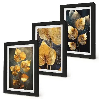 Juego de 3 cuadros decorativos con diseño de hojas en tonos amarillos sobre fondo oscuro