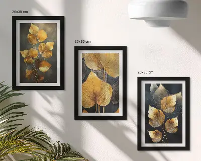 Juego de 3 cuadros decorativos con diseño de hojas en tonos amarillos sobre fondo oscuro