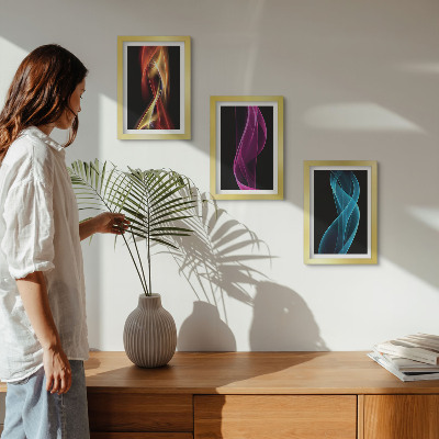 Juego de 3 cuadros decorativos Ondas de coloridas líneas de neón sobre un fondo oscuro