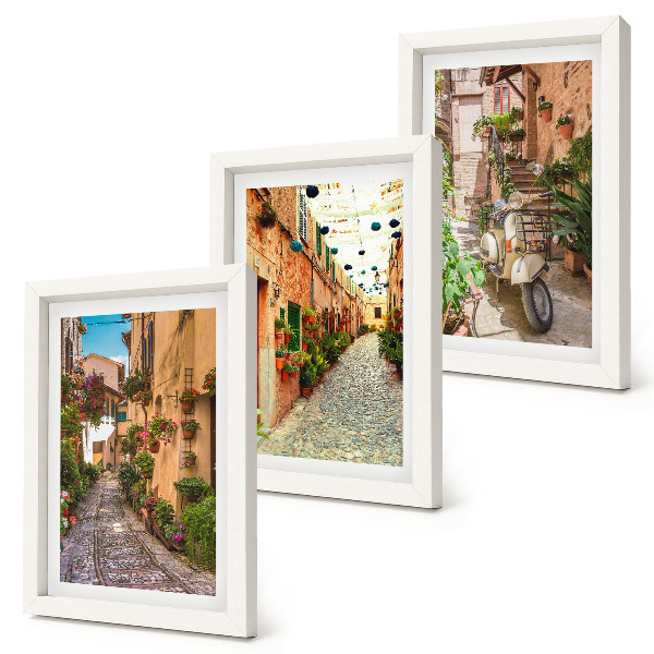 Juego de 3 cuadros decorativos Calles encantadoras con flores en un ambiente italiano.