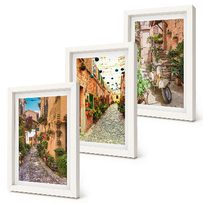 Juego de 3 cuadros decorativos Calles encantadoras con flores en un ambiente italiano.