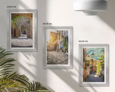 Juego de 3 cuadros decorativos con diseño de calles encantadoras con edificios y portones de piedra