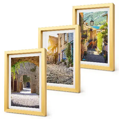 Juego de 3 cuadros decorativos con diseño de calles encantadoras con edificios y portones de piedra