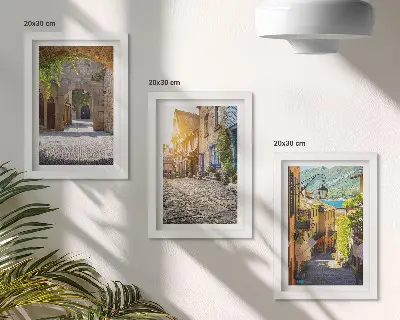 Juego de 3 cuadros decorativos con diseño de calles encantadoras con edificios y portones de piedra