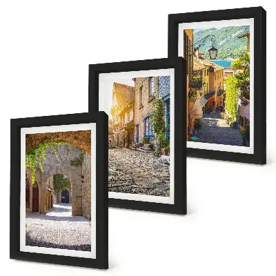 Juego de 3 cuadros decorativos con diseño de calles encantadoras con edificios y portones de piedra