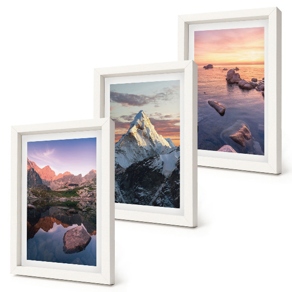 Juego de 3 cuadros decorativos Paisajes de montaña con agua y rocas al fondo.