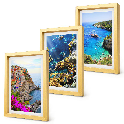 Tríptico enmarcado Vistas al mar con casas coloridas y un arrecife de coral.