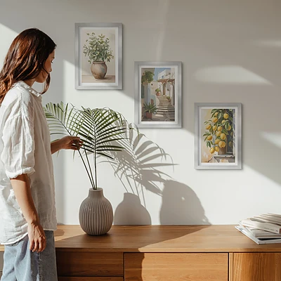 Juego de 3 cuadros decorativos con diseño de plantas en macetas y limones sobre fondo de calle