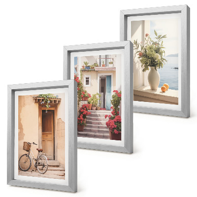 Juego de 3 cuadros decorativos Encantadoras calles costeras con flores y bicicletas.