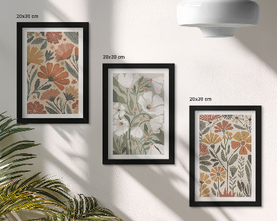 Tríptico enmarcado Estampados florales en tonos naranjas y verdes.