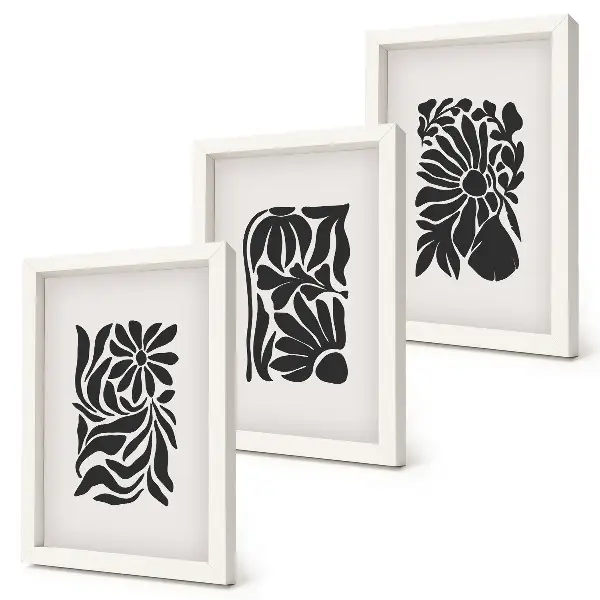 Tríptico enmarcado con diseños abstractos de plantas en tonos negros
