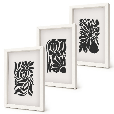 Tríptico enmarcado Diseños abstractos de plantas en tonos negros.