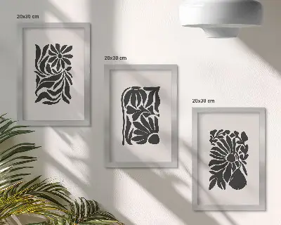 Tríptico enmarcado con diseños abstractos de plantas en tonos negros