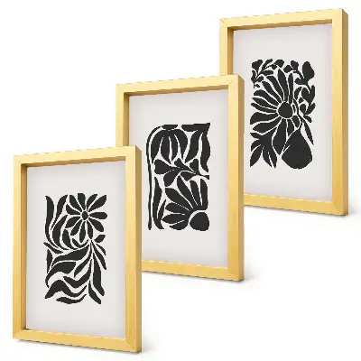 Tríptico enmarcado con diseños abstractos de plantas en tonos negros