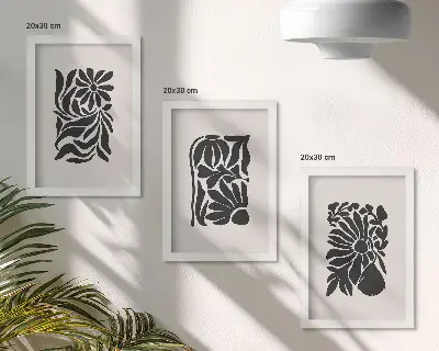 Tríptico enmarcado con diseños abstractos de plantas en tonos negros