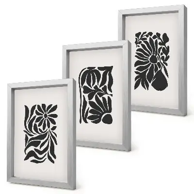 Tríptico enmarcado con diseños abstractos de plantas en tonos negros