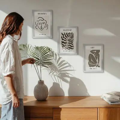 Juego de 3 cuadros decorativos con gráficos elegantes de líneas y figuras en colores neutros