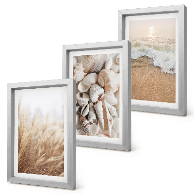 Juego de 3 cuadros decorativos Motivos playeros con conchas y olas del mar.