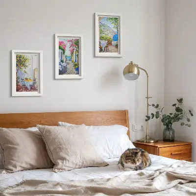 Juego de 3 cuadros decorativos con diseño de calles encantadoras llenas de plantas y vistas al mar