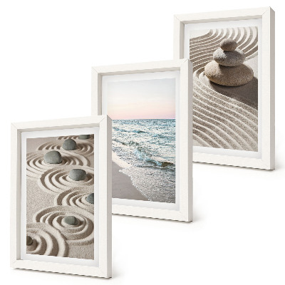 Juego de 3 cuadros decorativos Olas tranquilas de arena y agua con piedras en la playa.