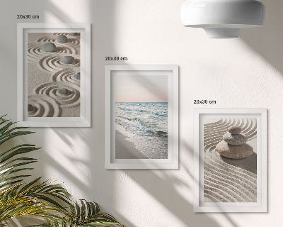 Juego de 3 cuadros decorativos Olas tranquilas de arena y agua con piedras en la playa.
