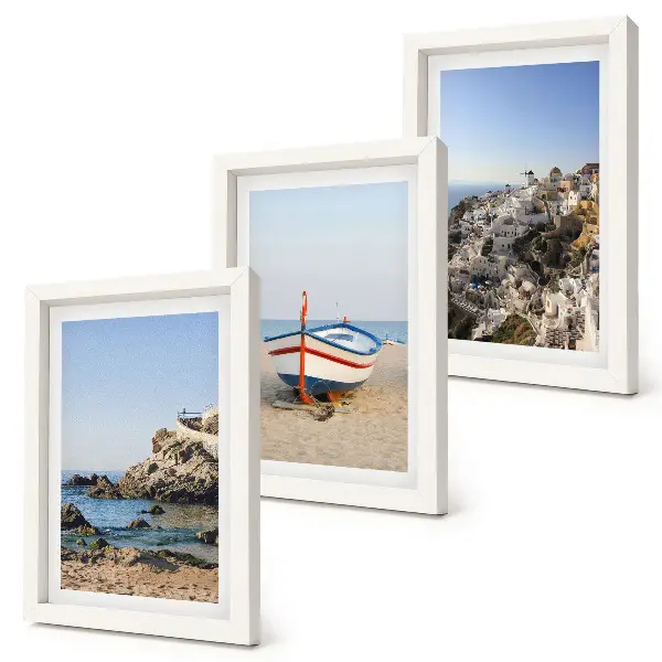 Juego de 3 cuadros decorativos con vistas costeras de barcos y casas blancas en Grecia