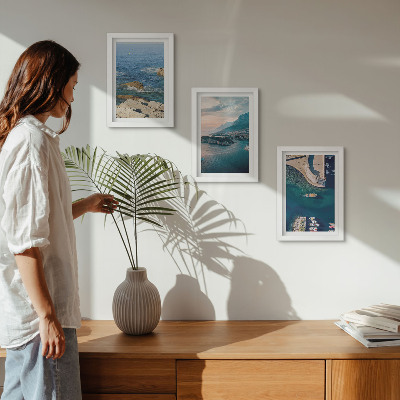 Juego de 3 cuadros decorativos Vistas al mar con acantilados y puertos de montaña.