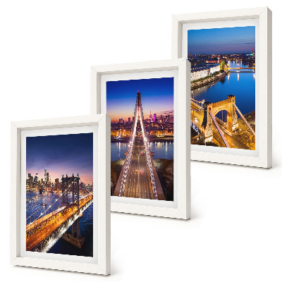 Juego de 3 cuadros decorativos Vistas nocturnas de ciudades con puentes y ríos.