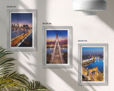 Juego de 3 cuadros decorativos Vistas nocturnas de ciudades con puentes y ríos.